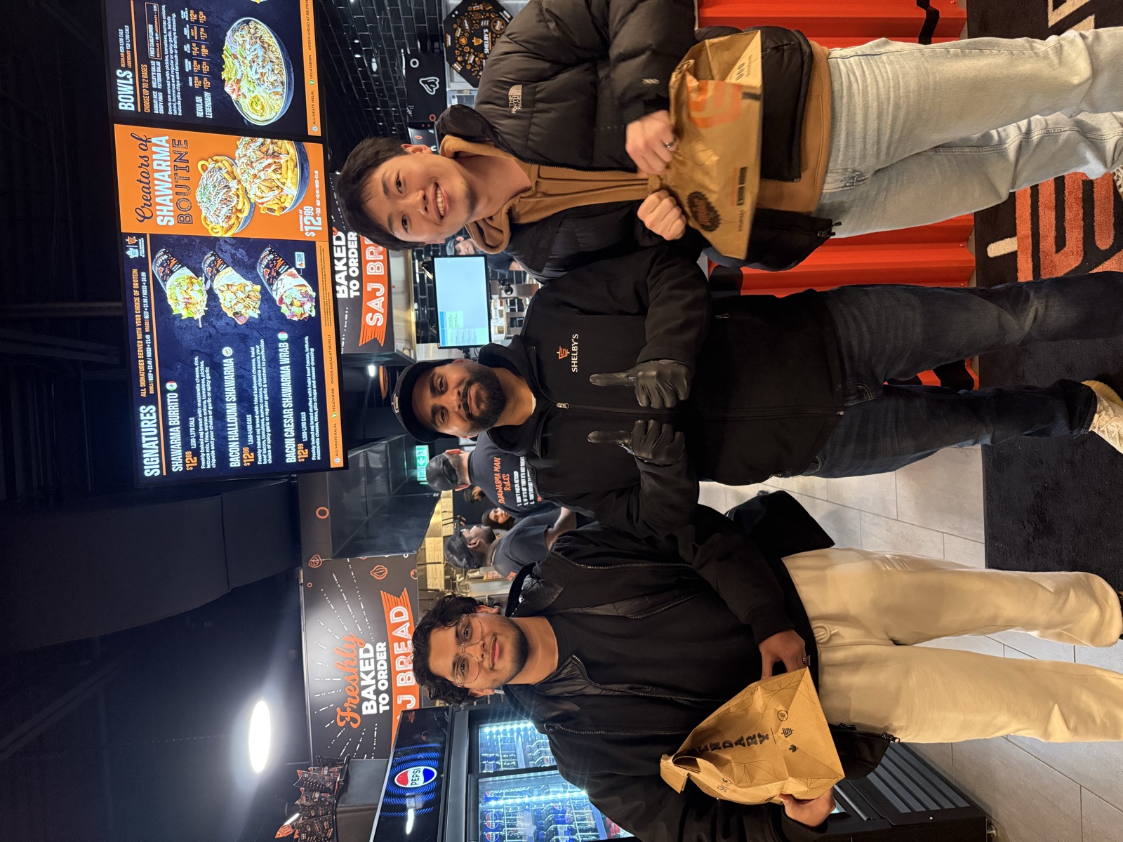 Friends at a shawarma restaurant