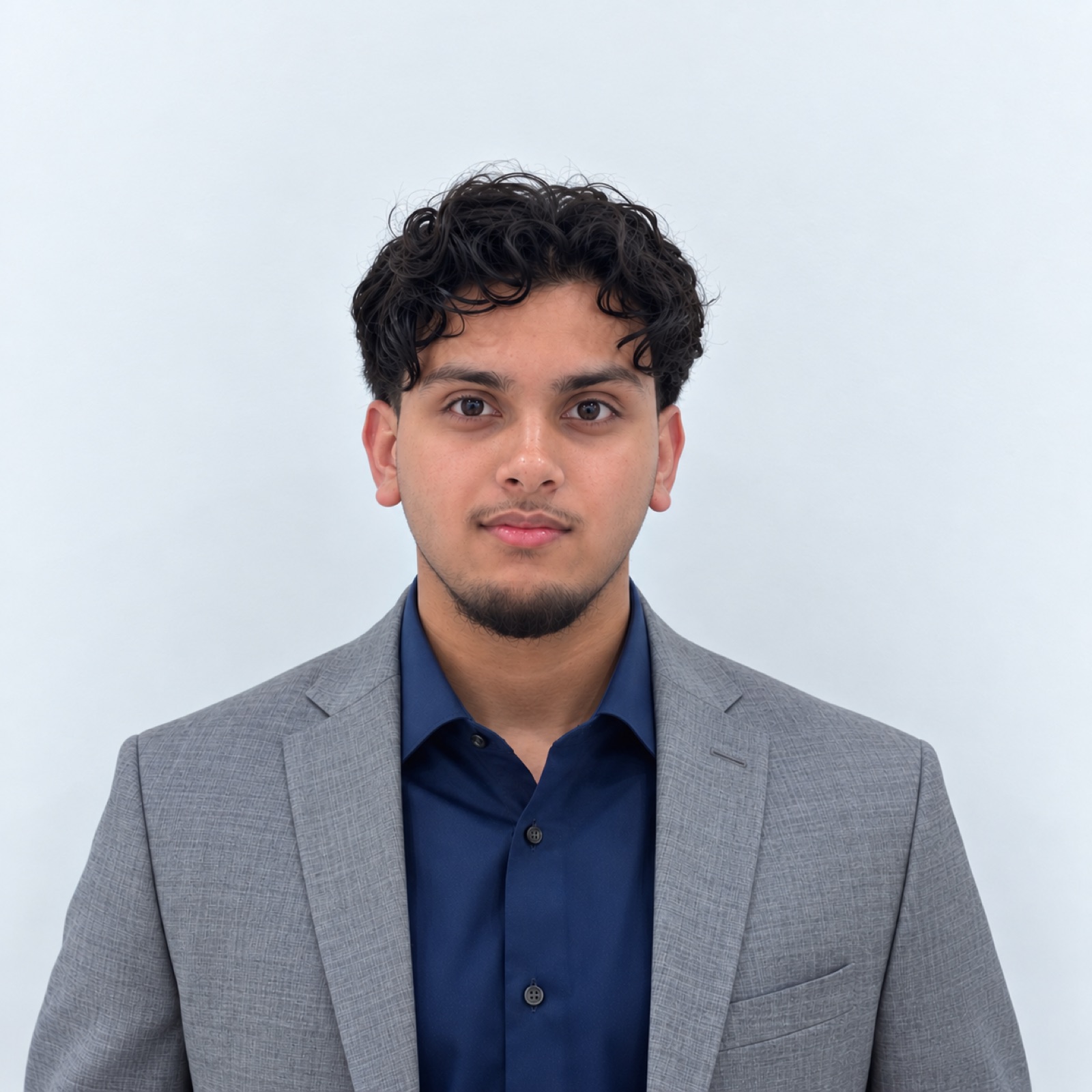 Fahmid Khan in a grey suit